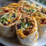 Irresistible 7-Layer Dip Tortilla Pinwheels in 20 Minutes 10 7-Layer Dip Tortilla Pinwheels