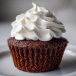 Spooky Chocolate Ghost Cupcakes with 5 Secret Tricks for Halloween 8 Chocolate Ghost Cupcakes with White Frosting
